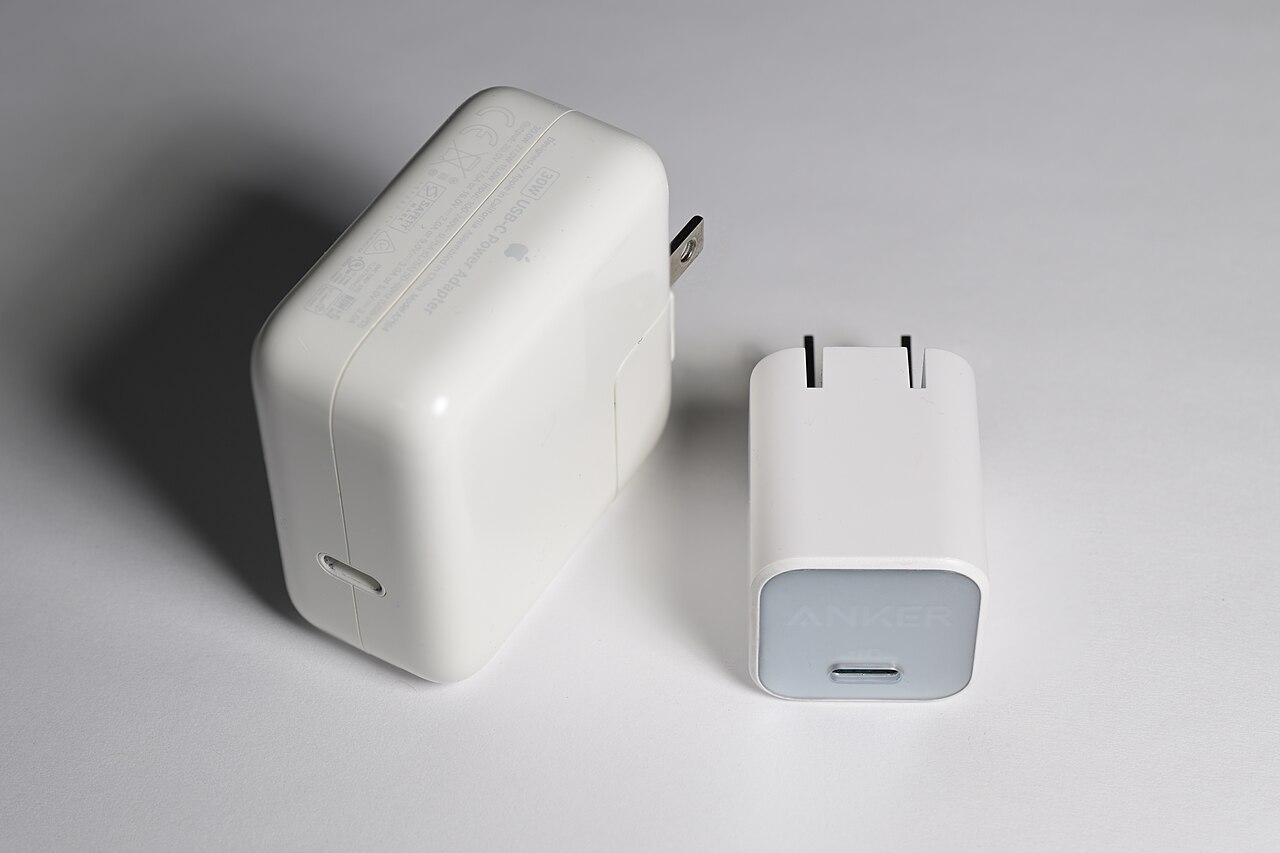 Apple 30W charger on the left and the smaller Anker 511 30W charger on the right